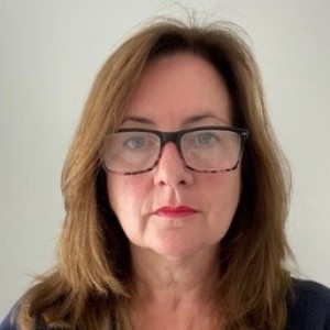A photograph of Caroline Corrigan, Chief People Officer of NHS Frimley